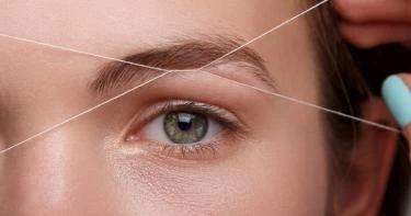 إزالة الشعر بالخيط
