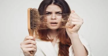 أسباب تساقط الشعر عند النساء
